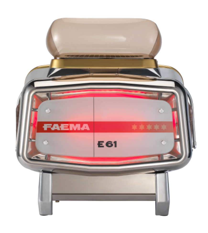 Rear view of Faema E61 Legend espresso machine with illuminated back panel. The legendary Faema E61’s rear panel glows with its iconic red-lit design and polished steel finish.