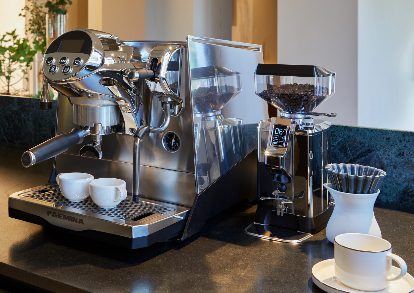 Faemina silver espresso machine with coffee grinder and white cups on modern countertop - Faemina Silver Espresso Machine with Grinder – Sleek Home Barista Setup - A silver Faemina espresso machine paired with a precision grinder – perfect for any modern kitchen or café.