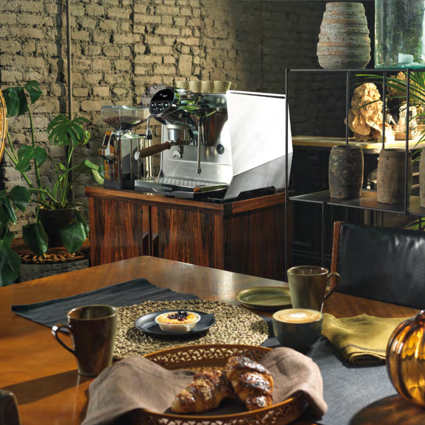 "White Faemina Espresso Machine in a cozy kitchen café setup with coffee and pastries" - Faemina Espresso Machine in White – Elegant Kitchen Coffee Setup - White Faemina espresso machine styled in a cozy kitchen coffee corner with pastries and coffee cups.